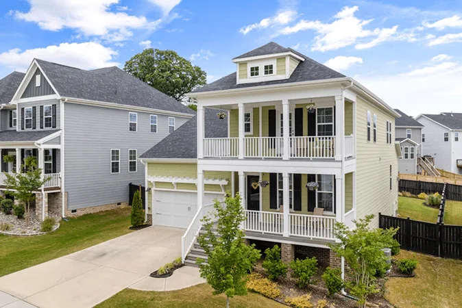 Suburban U.S. home representing challenges in navigating international estate planning, with a focus on property management.